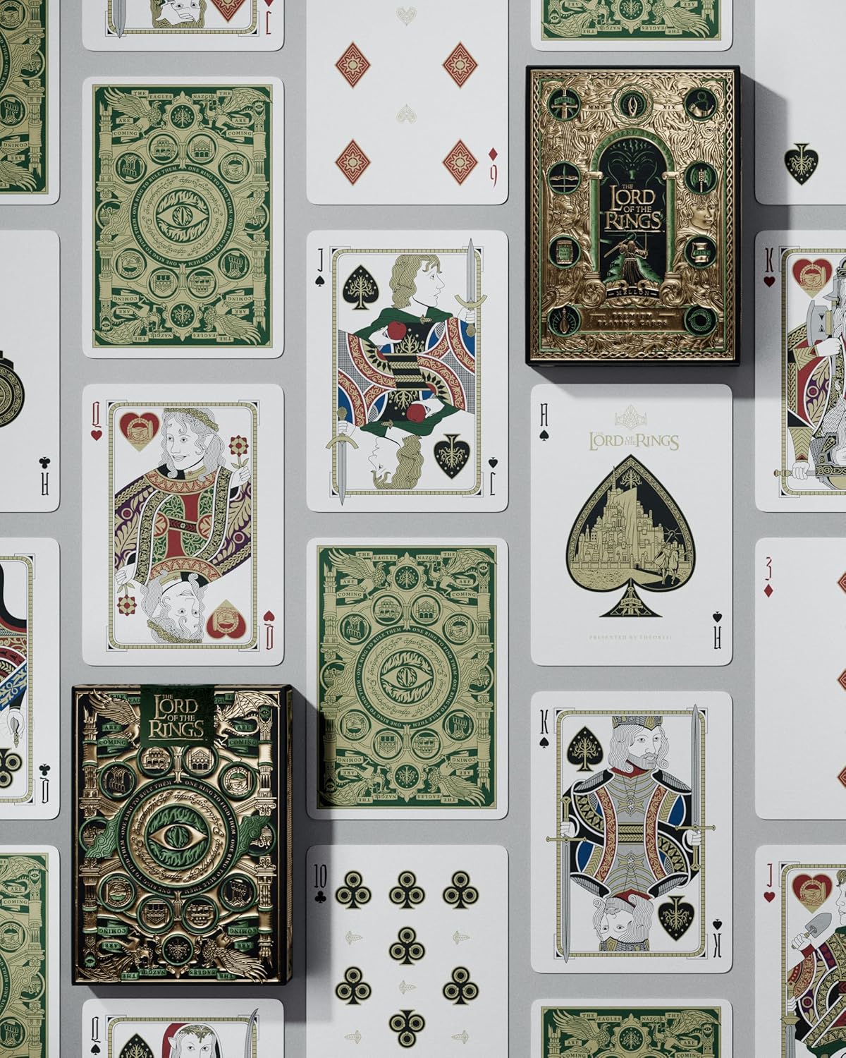 Collection of 'The Lord of the Rings' themed playing cards on a gray background
