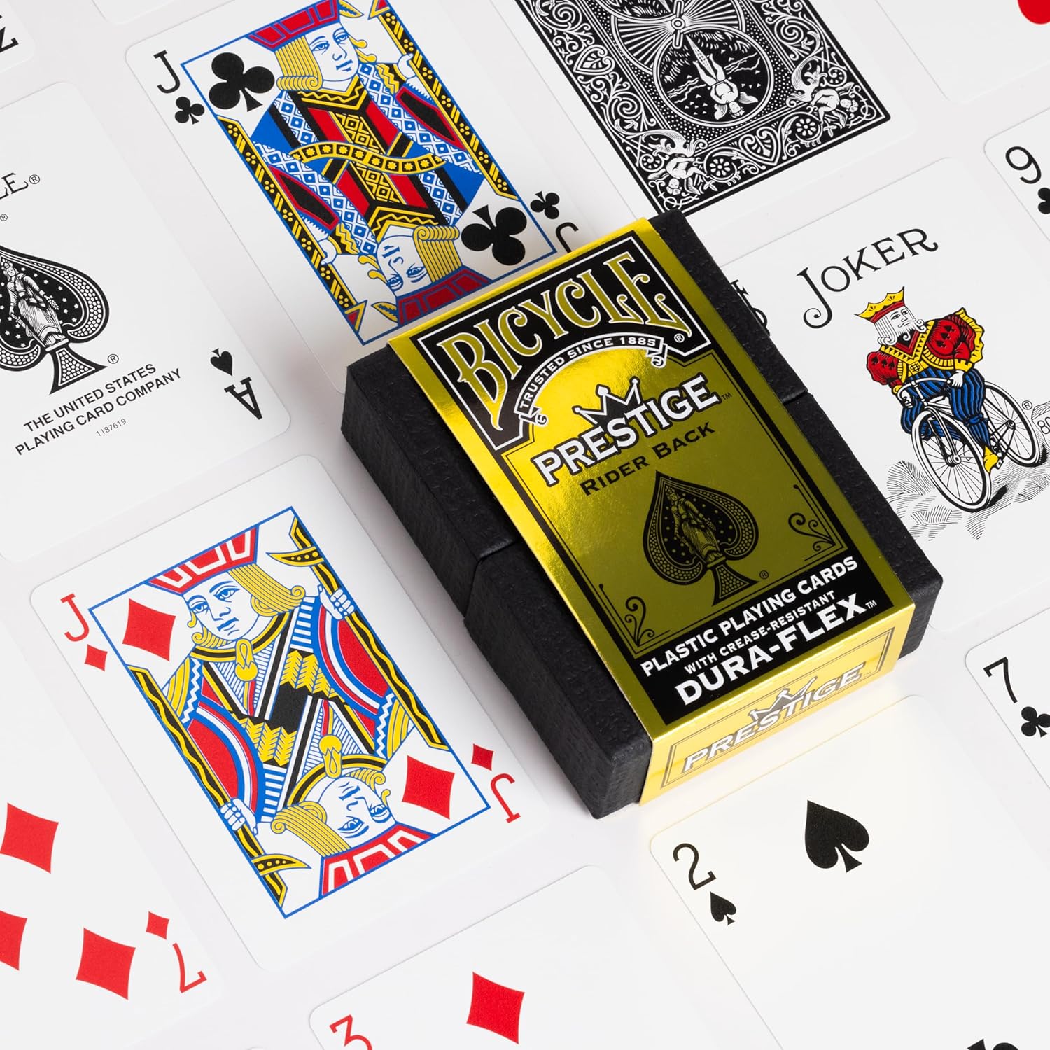 Bicycle Prestige black playing cards with card faces showing on a white background