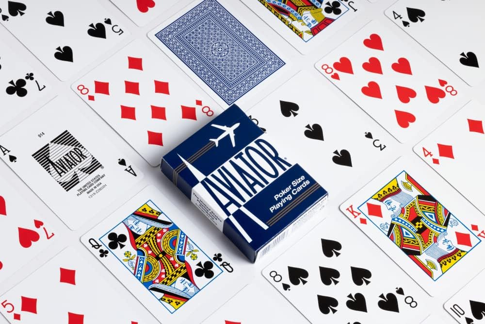 Playing cards with a focus on the 'Aviator' brand packaging.