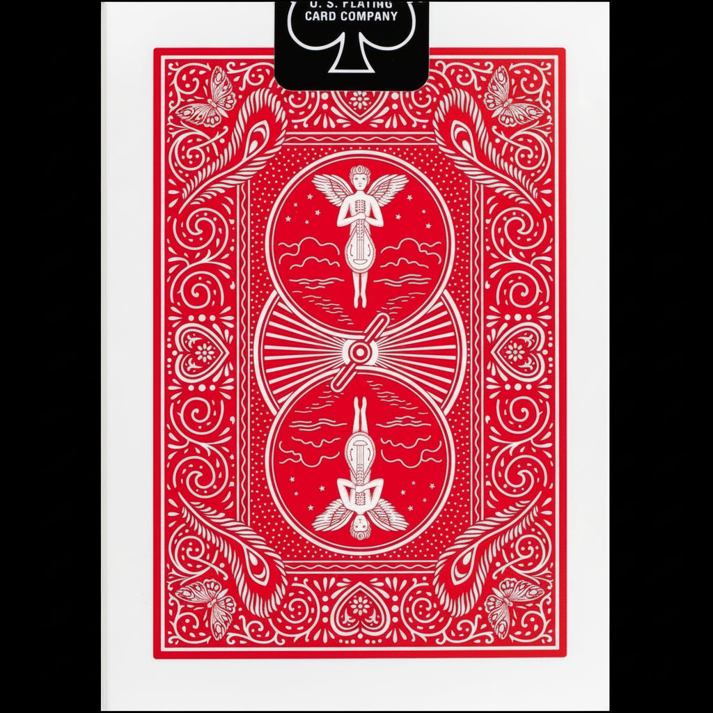 Red playing card with intricate designs on a white background
