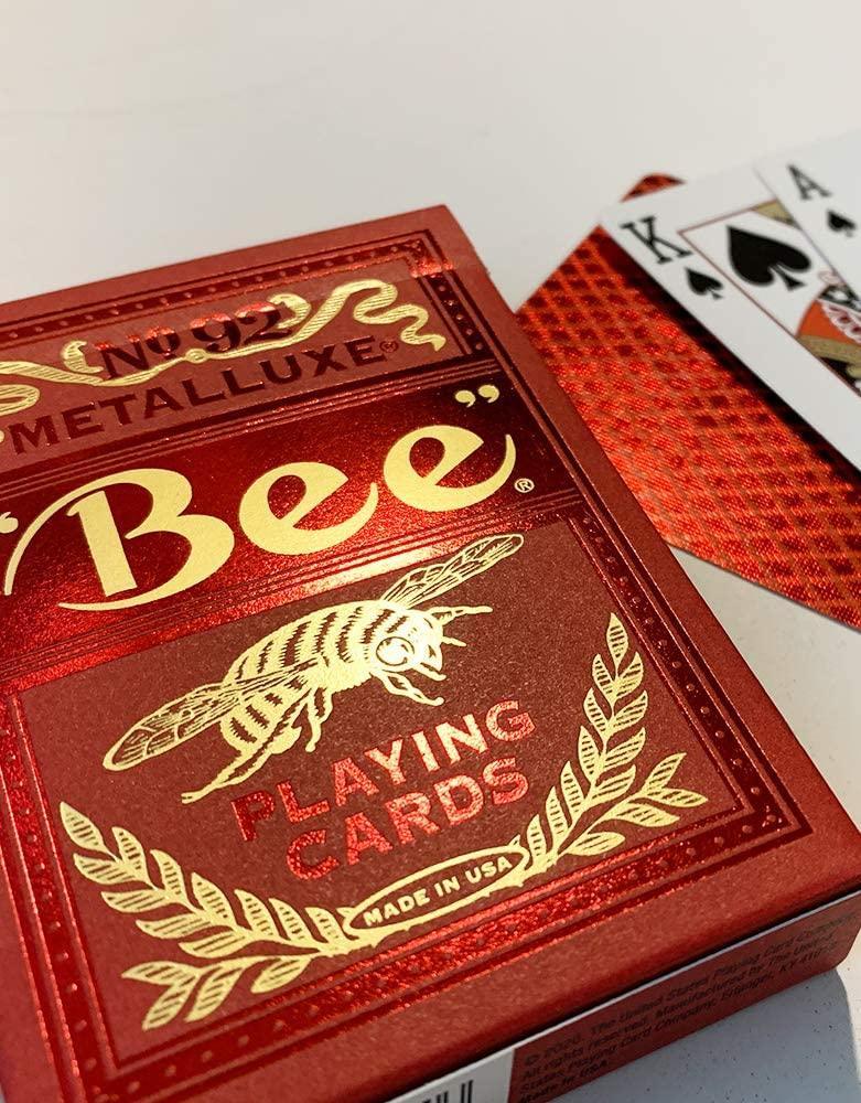 Red playing card box with gold text and 'Bee' Metalluxe branding on a white background