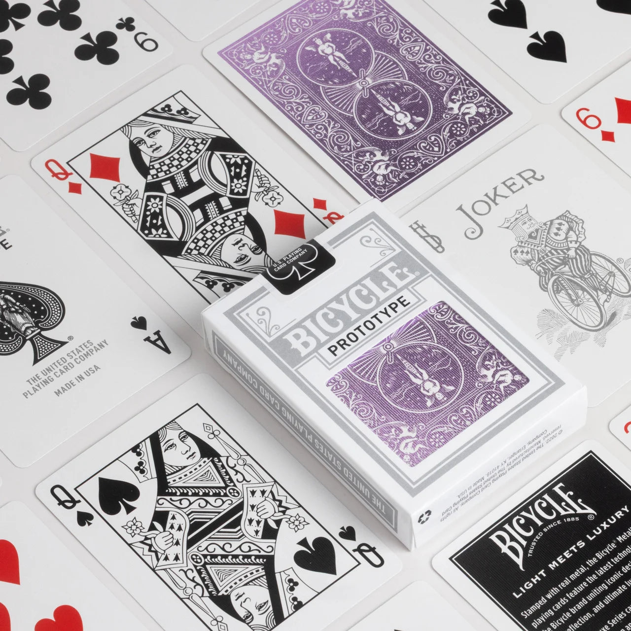 Bicycle Prototype MetalLuxe Cards with purple design on a white background