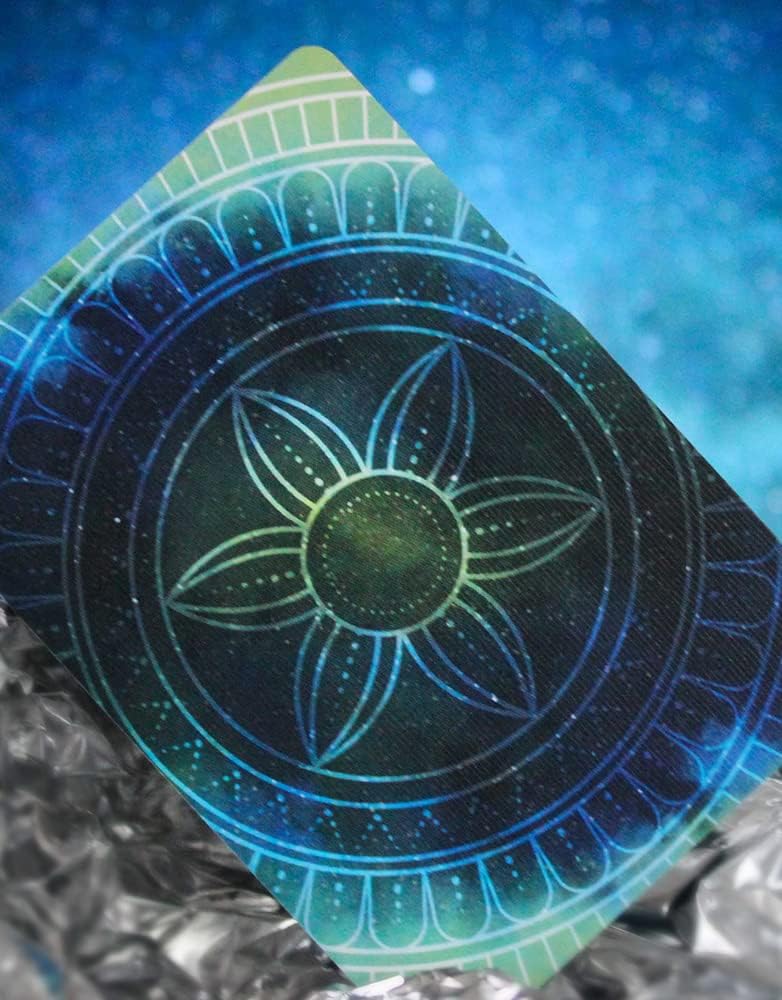 Card with a star-like design on a blue and green gradient background