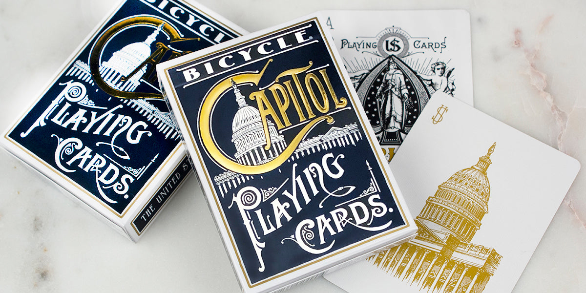 Bicycle Capitol playing cards on a marble surface