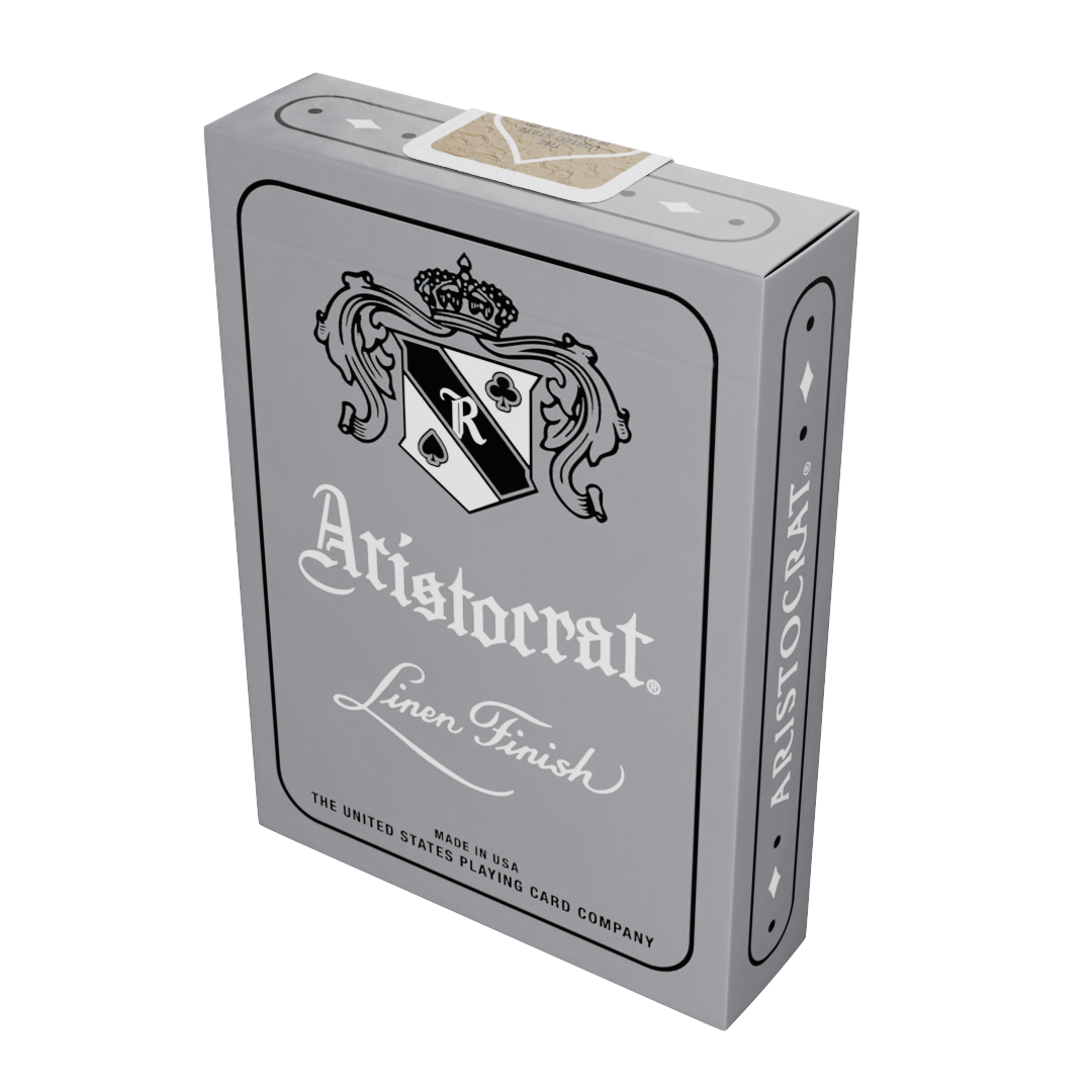 Aristocrat 727 Silver 110th Anniversary deck in silver tuck box, front and right side visible with crest logo and linen finish text.