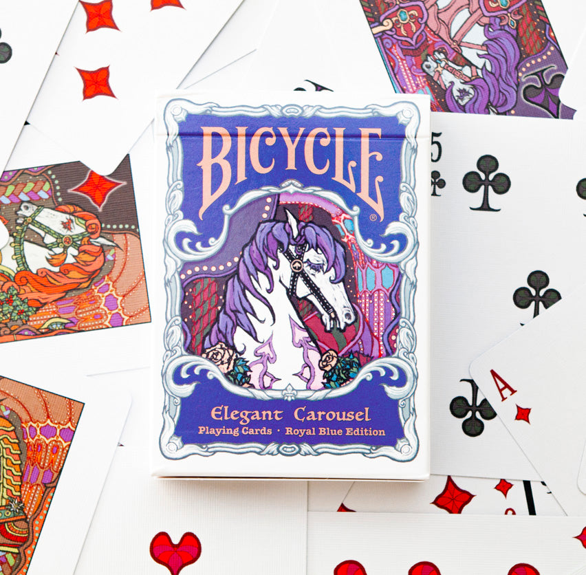 Close-up of Bicycle Elegant Carousel Royal Blue Edition tuck box with custom ace and card back artwork