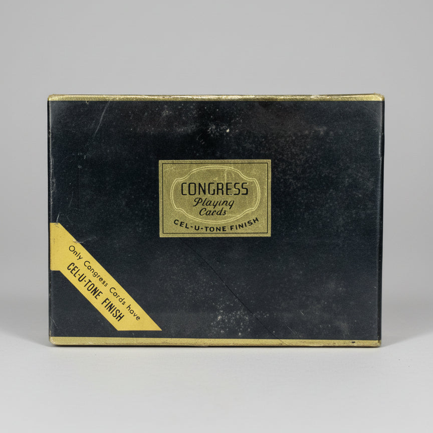 Vintage Congress Playing Cards box with gold label on a white background