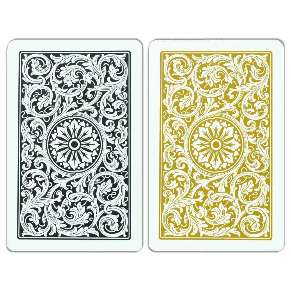 Two Copag 1546 Bridge Size Jumbo Index (Black & Gold) playing cards with intricate floral patterns on a white background