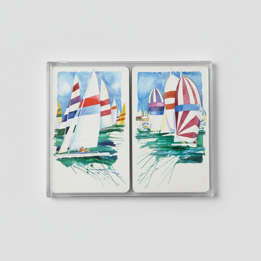 Hoyle 100% Cellulose Acetate playing cards with sailboat designs on a black background