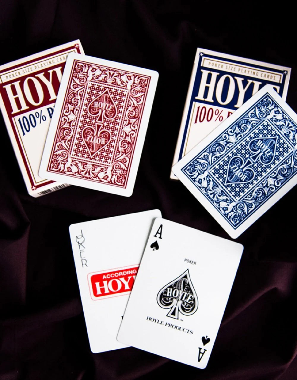 Hoyle 100% plastic playing cards in red and blue on a dark background