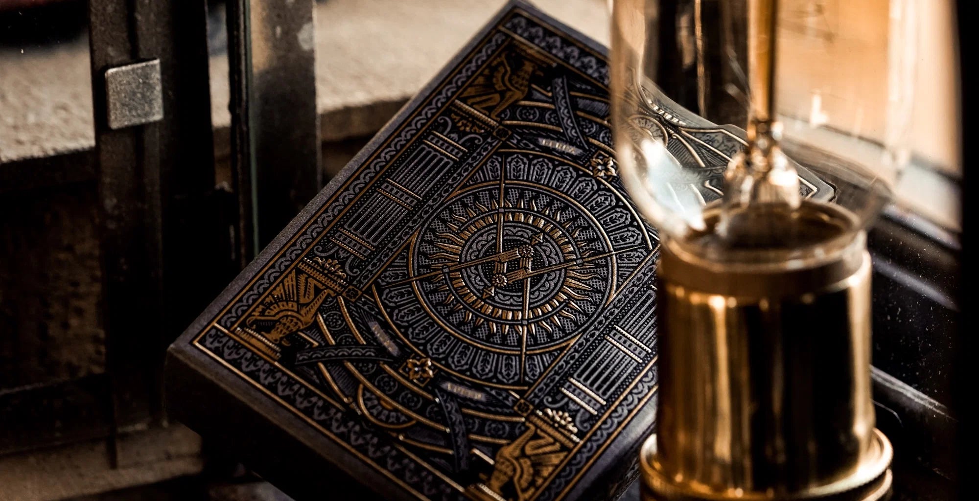 Theory11 Black Hudson tuck back with ornate circular design and gold detailing