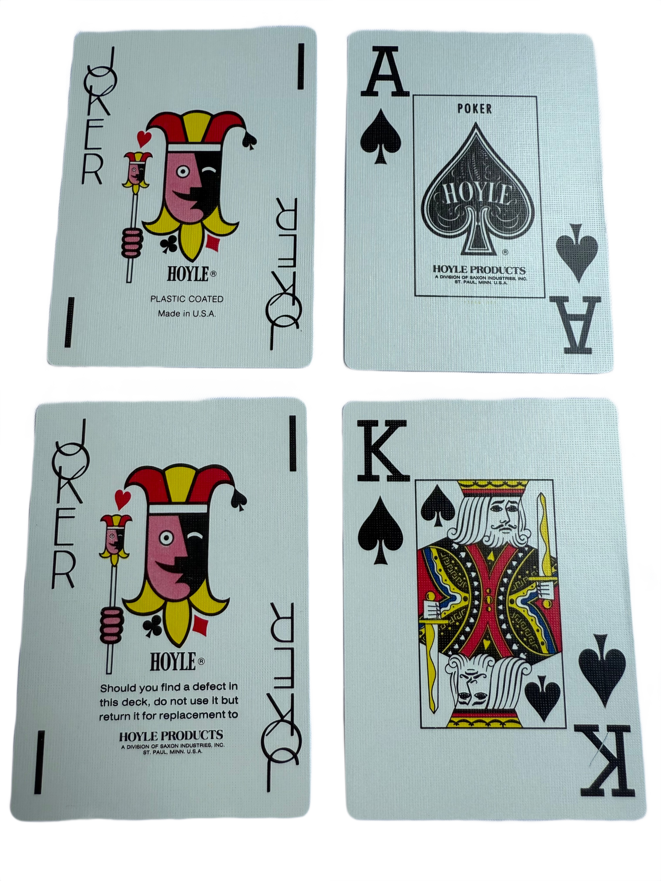 Four playing cards with Joker, Ace of Spades, King of Spades, and King of Hearts on a white background.