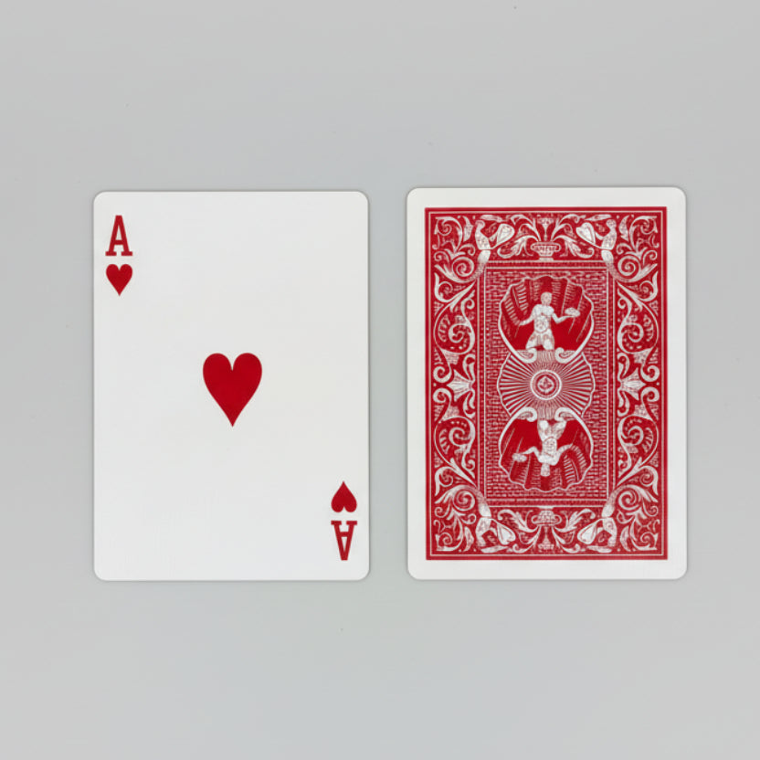 Hoyle laying cards, including an Ace of Hearts and a shell card back