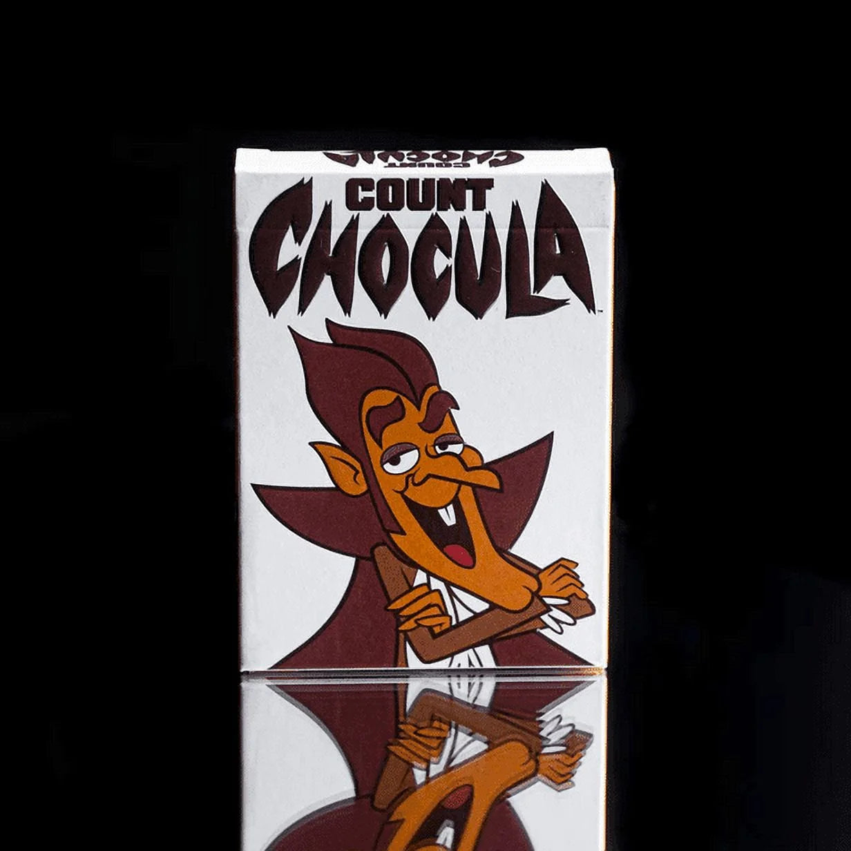 Count Chocula cereal box with a cartoon character on a black background