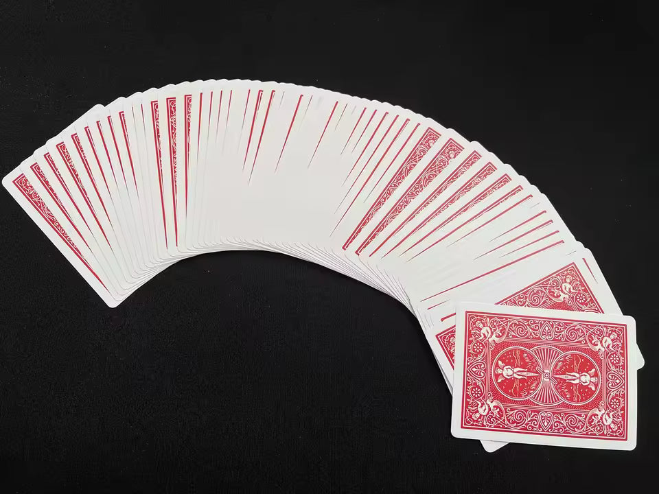Fanned-out deck of playing cards with red and white design on a black background