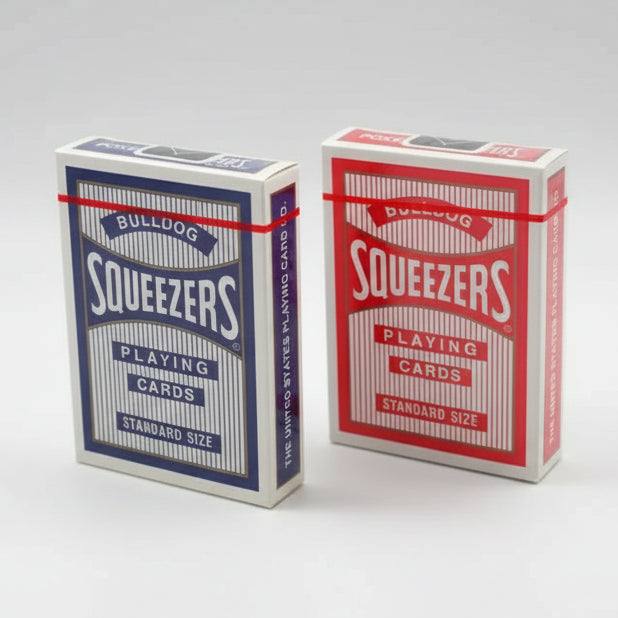 Two boxes of Bulldog Squeezers playing cards, one blue and one red, on a white background.