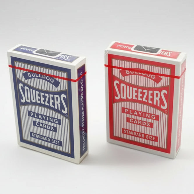 Two boxes of Bulldog Squeezers playing cards, one blue and one red, on a white background.