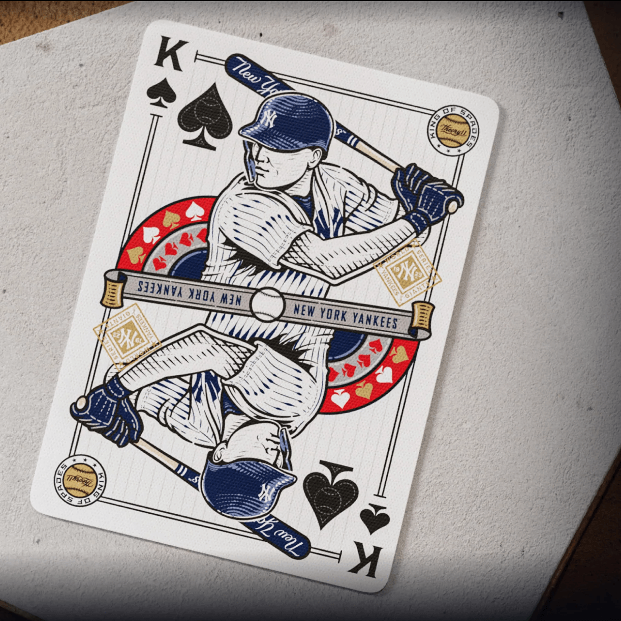 King of spades from Theory11 New York Yankees deck showing a Yankees batter illustration in blue, red, and gold.