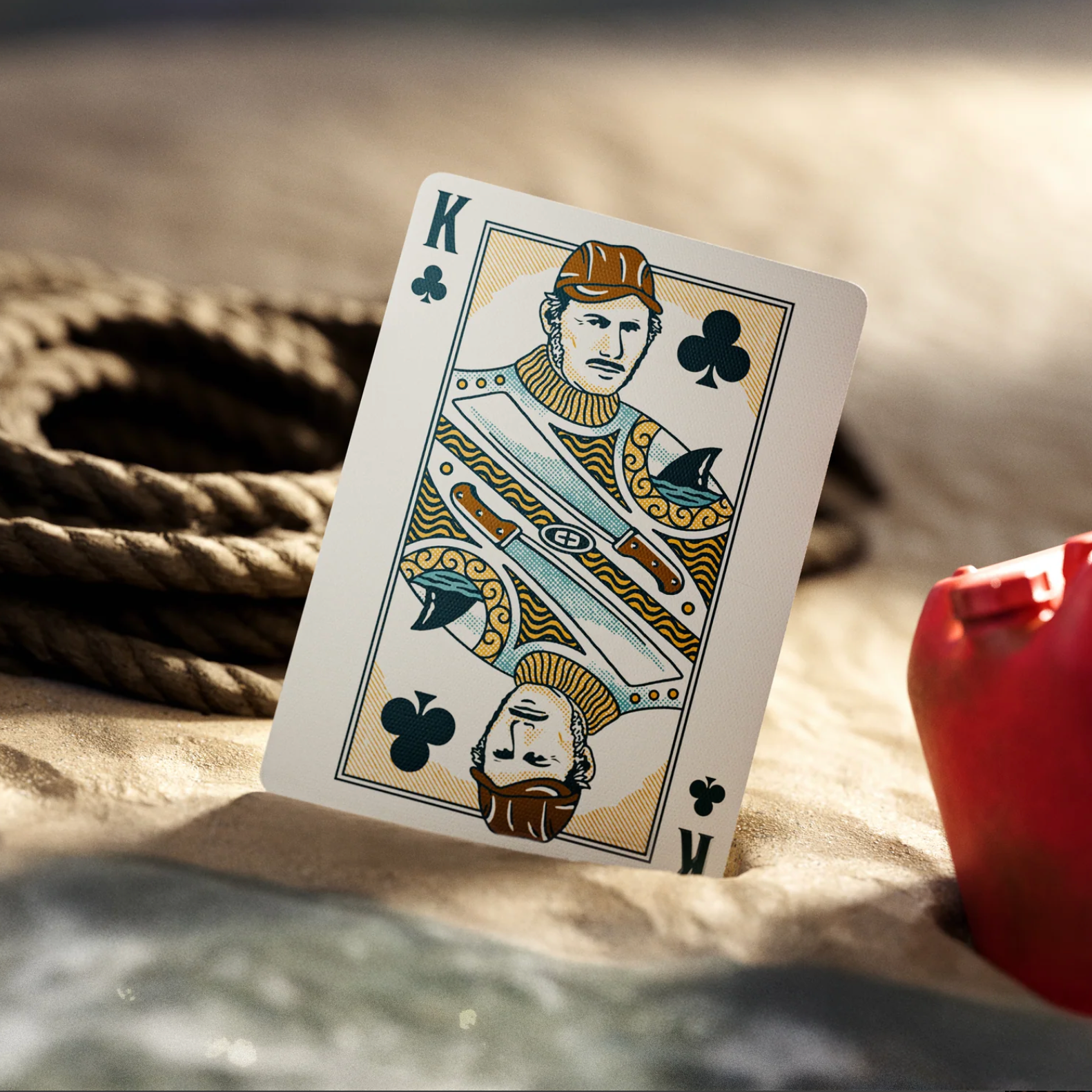 Theory11 JAWS custom king of clubs court card on beach
