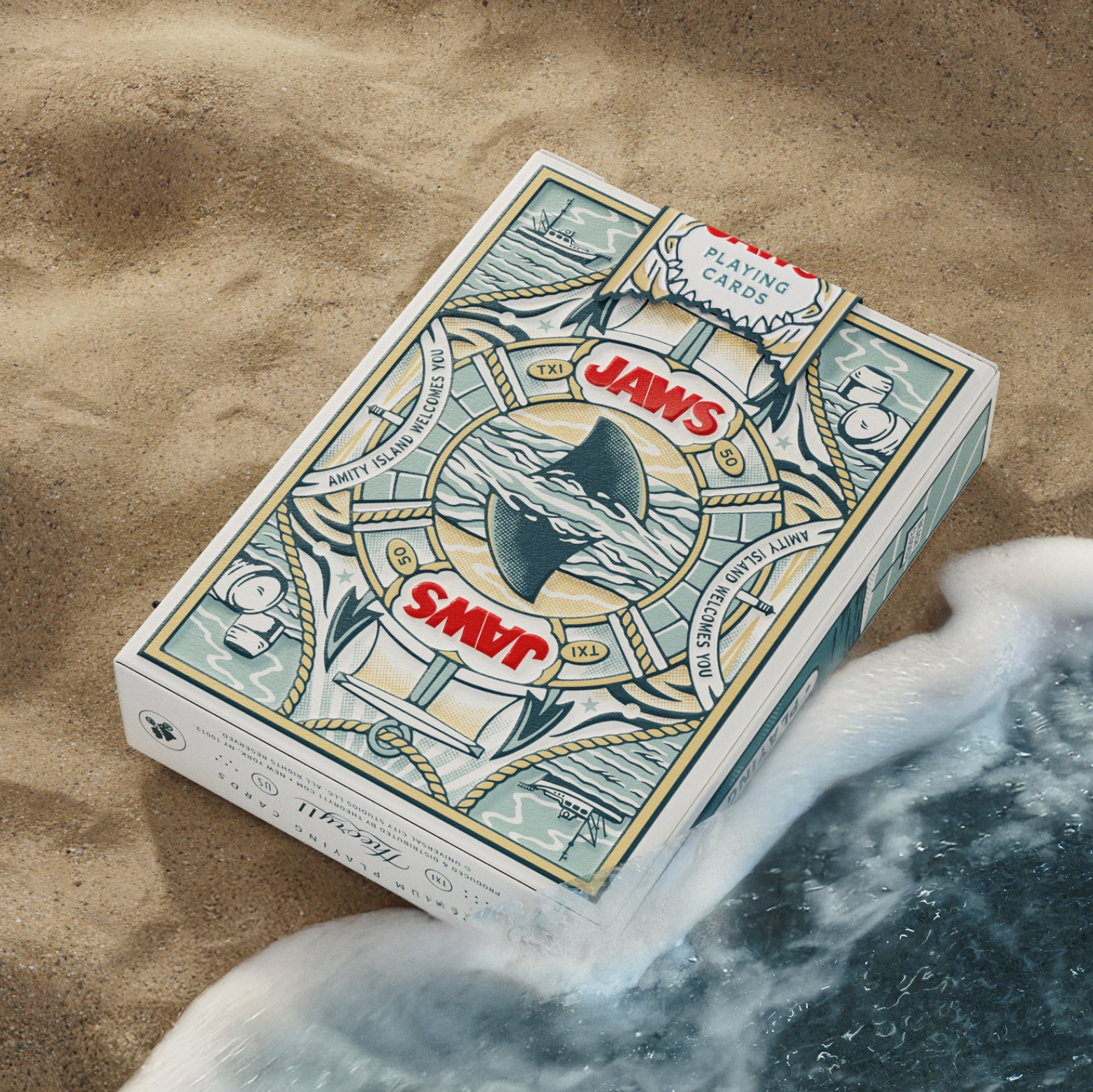 Theory11 JAWS card deck showing custom back design near shoreline