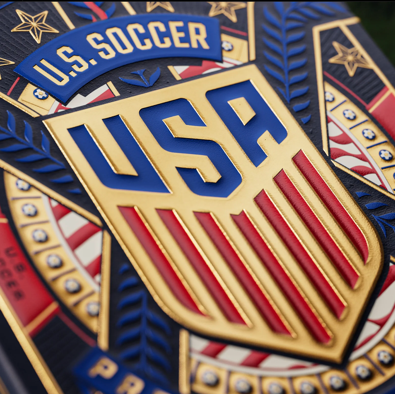 Embossed USA crest and gold foil on Theory11 U.S. Soccer tuck box
