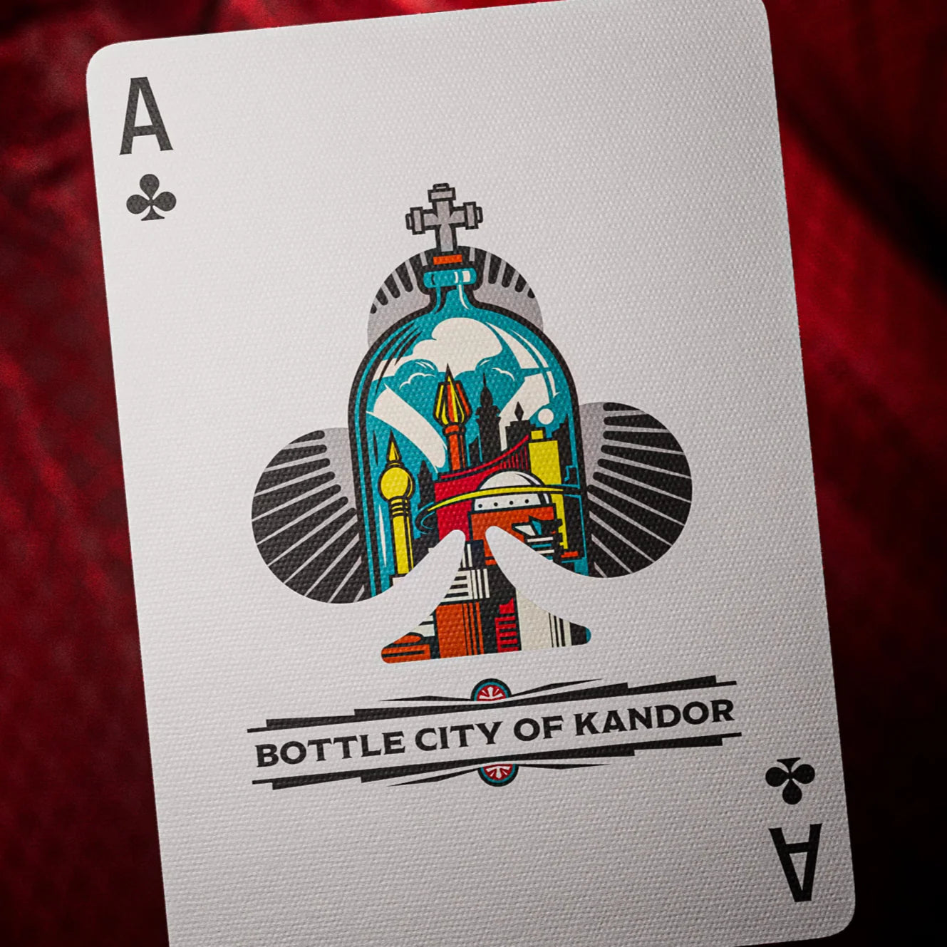 Playing card with 'Bottle City of Kandor' design on a red background