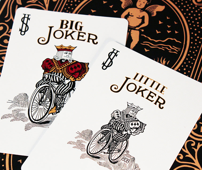 Two playing cards labeled 'Big Joker' and 'Little Joker' on a decorative background.