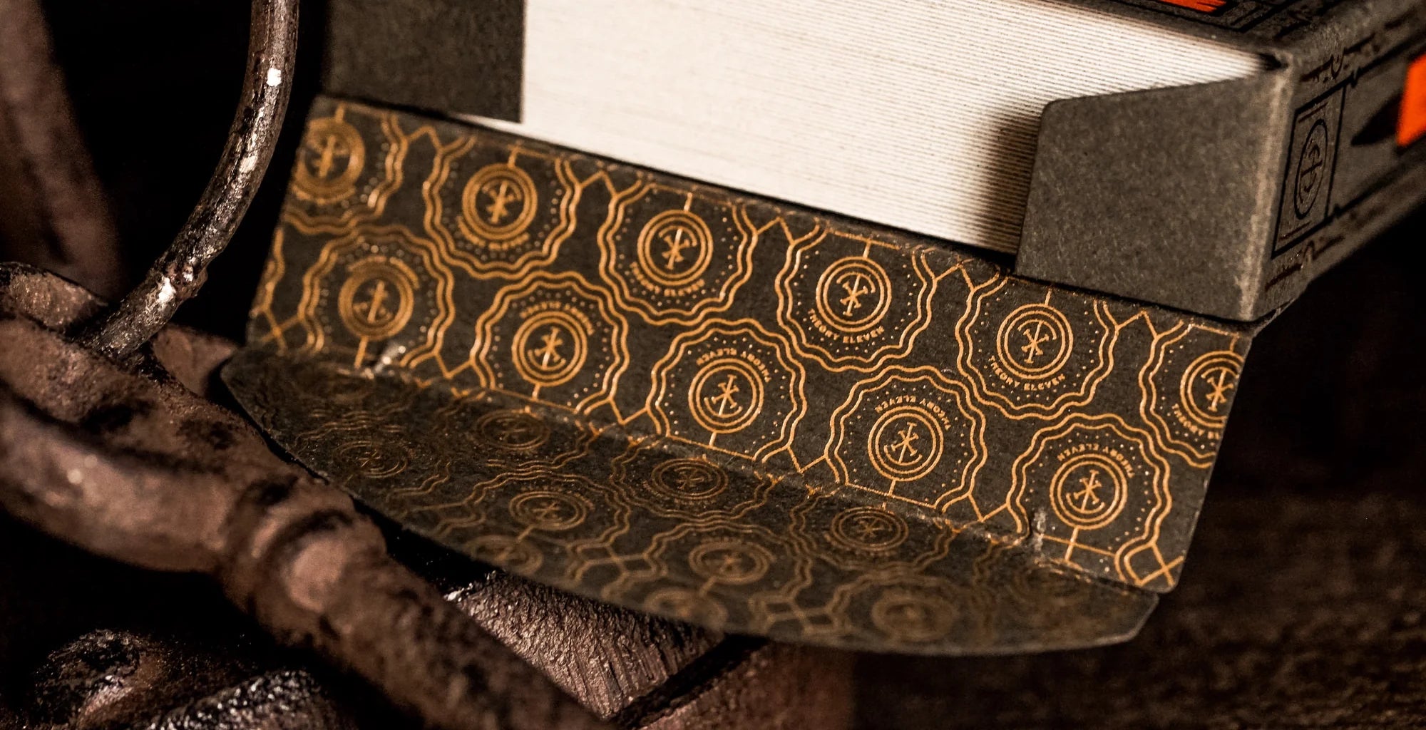 Close-up of a textured box with intricate patterns on a dark background