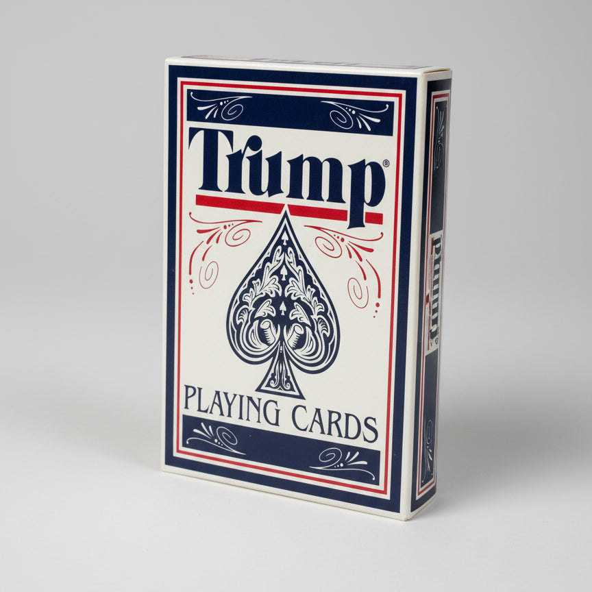 Trump playing cards packaging with blue and red design on a black background