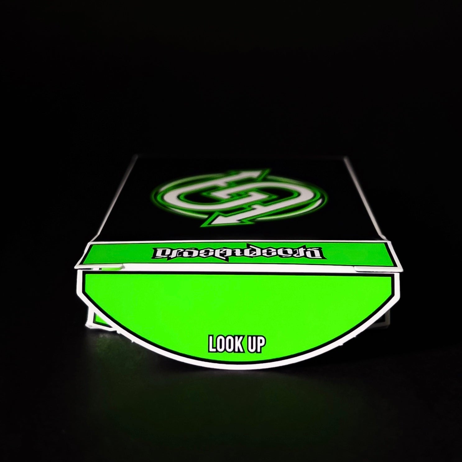 Green and white Descendents Playing Cards box with text on a black background