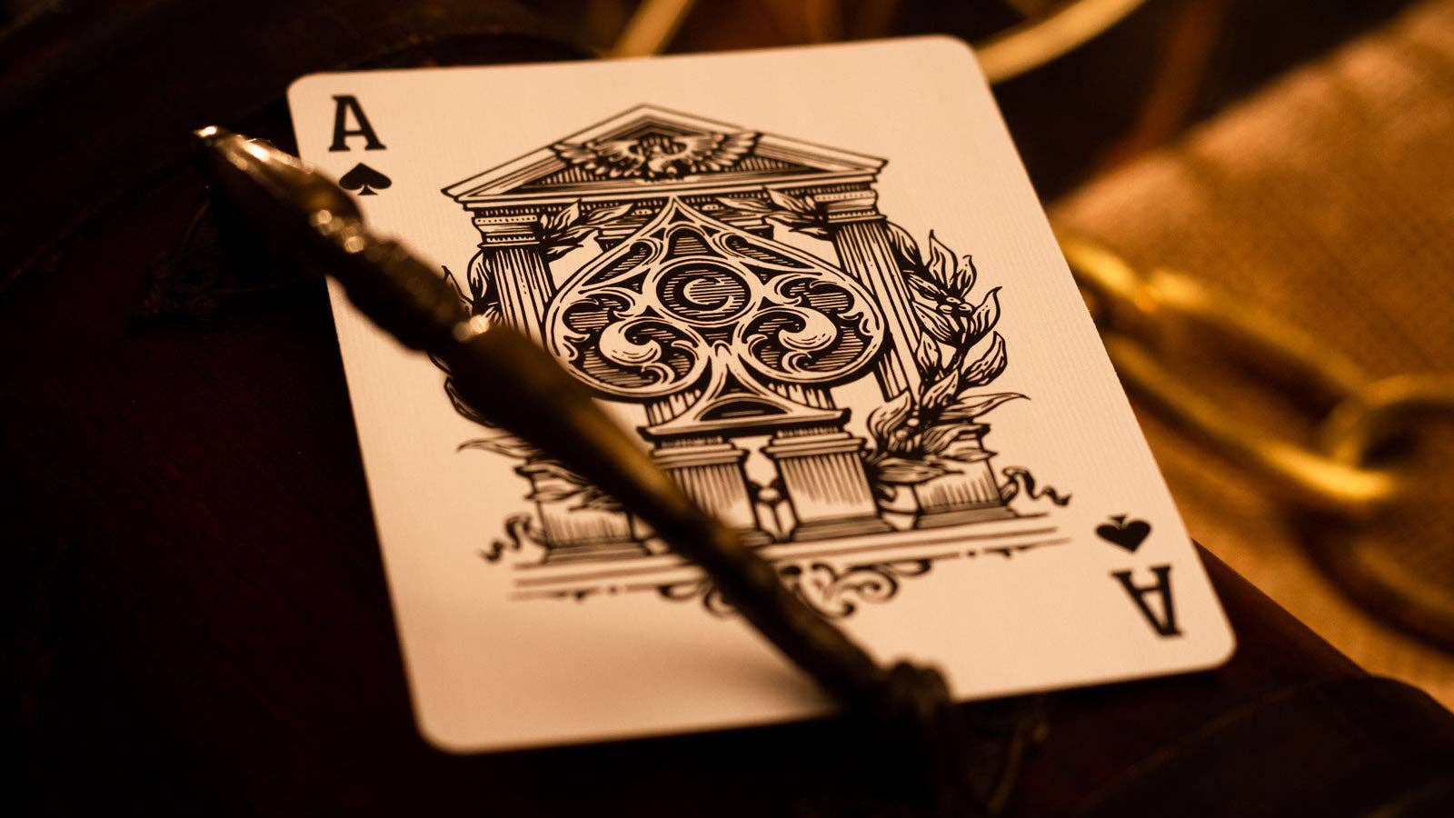 Centurio playing card with ornate design and 'A' symbol on a dark background.