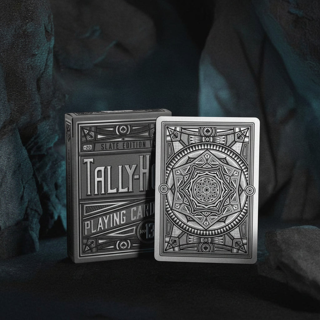Tally-Ho playing cards with intricate design on a dark background