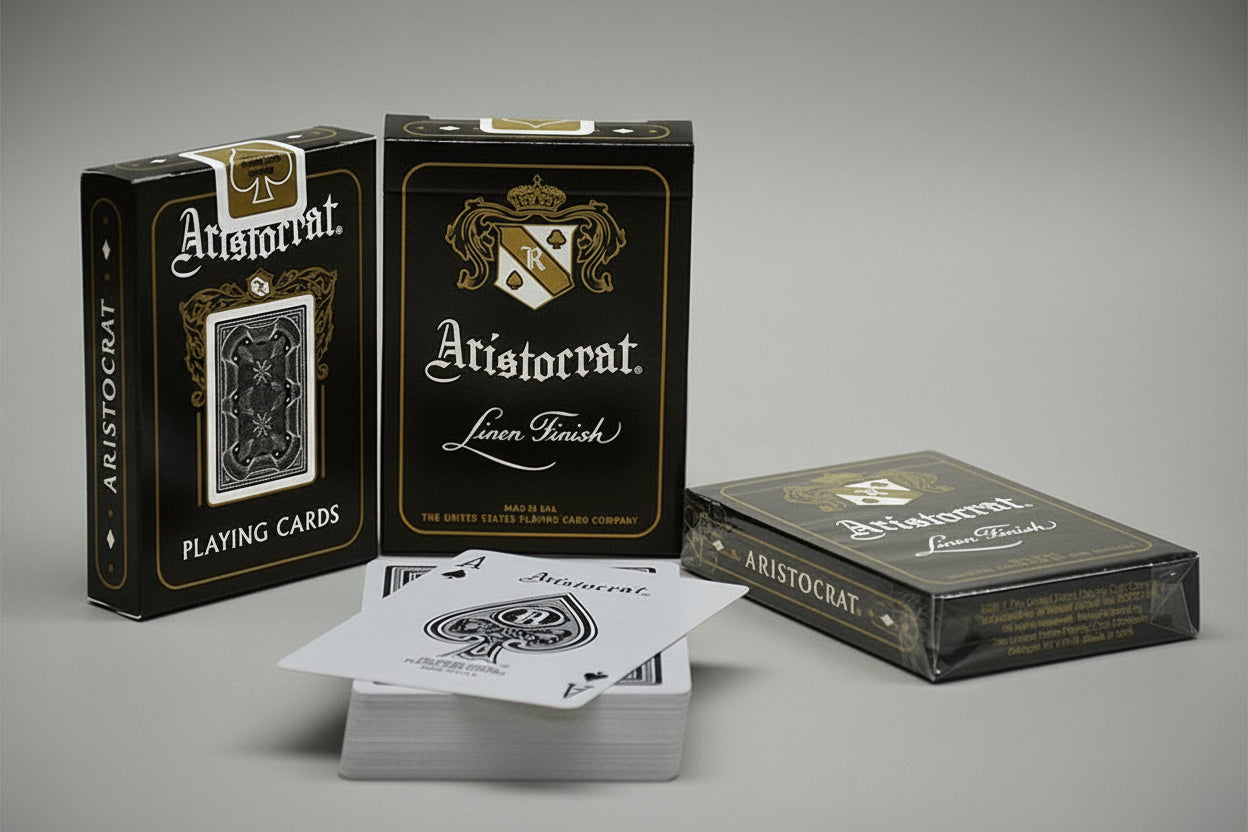 Aristocrat playing cards with packaging on a yellow surface