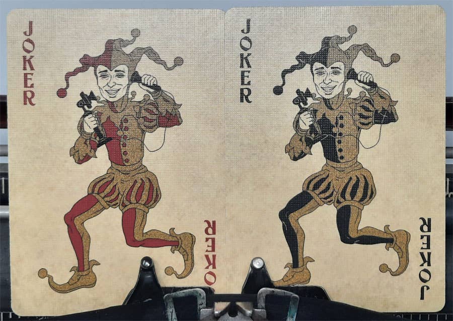 Two joker cards from a vintage deck with colorful illustrations on a textured background.