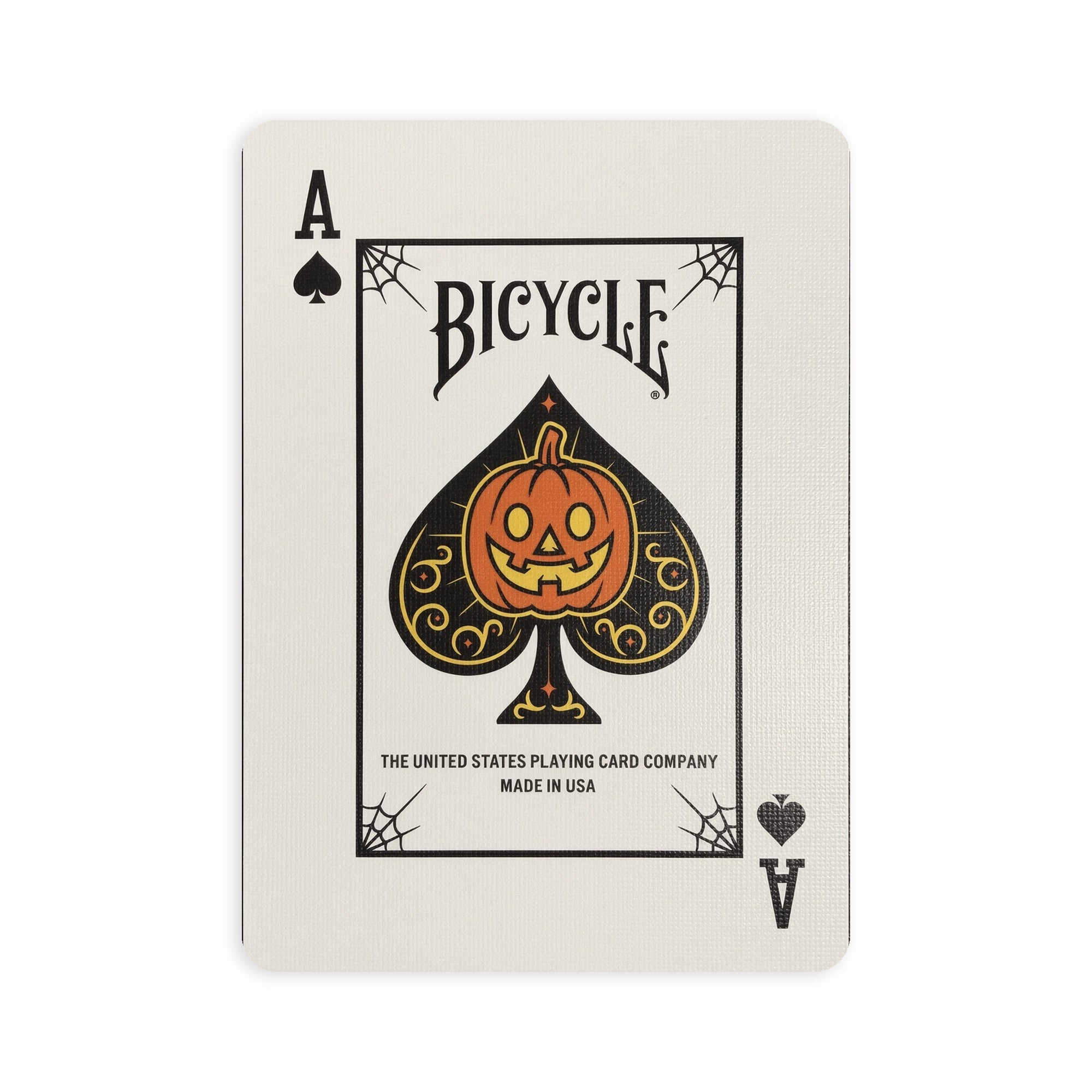 Custom Ace of Spades from Bicycle Classic Halloween featuring a smiling orange jack-o’-lantern inside an ornate black-and-gold spade.