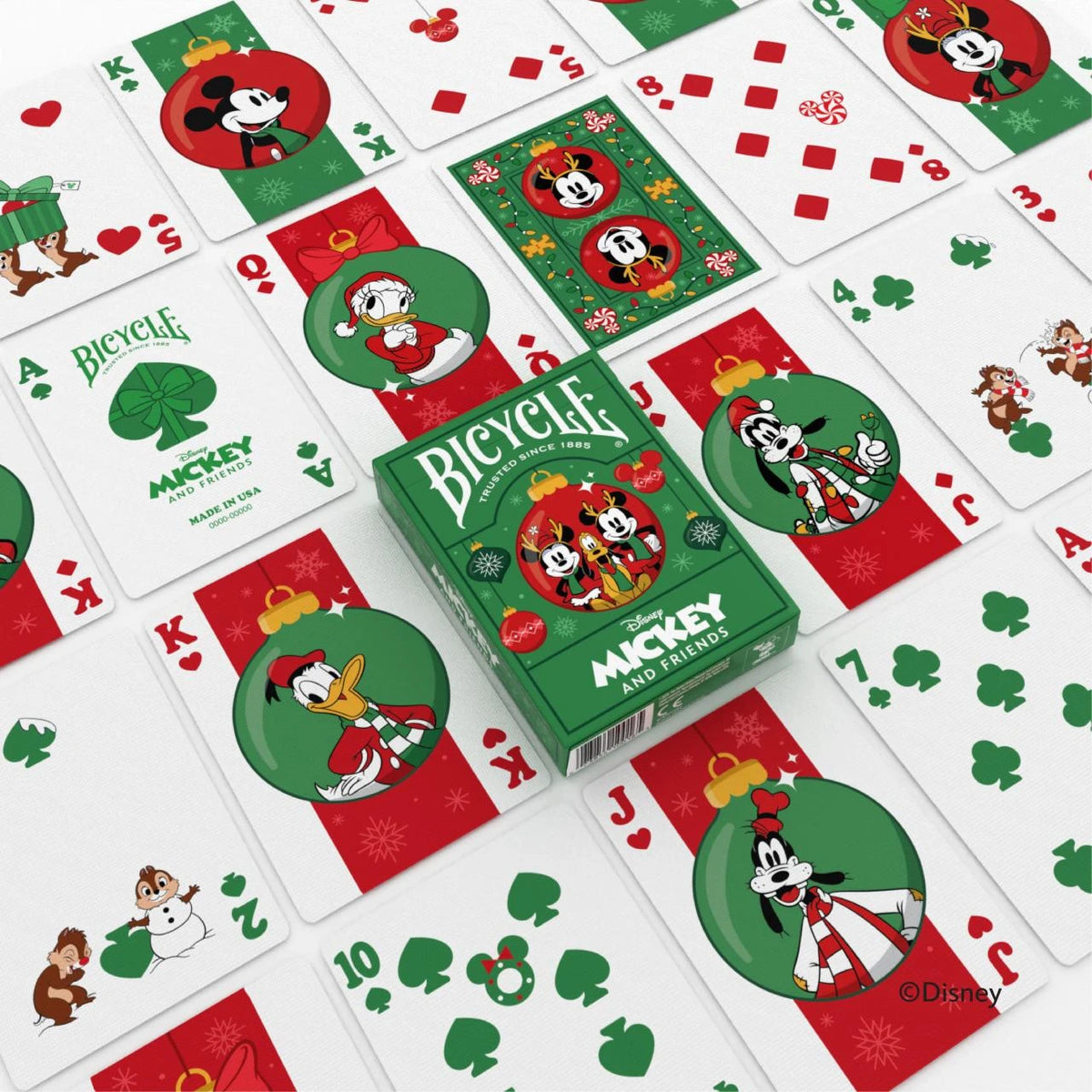 Bicycle Disney Mickey and Friends Holiday tuck box among character courts, a gift-themed Ace, decorated number cards, and a card back
