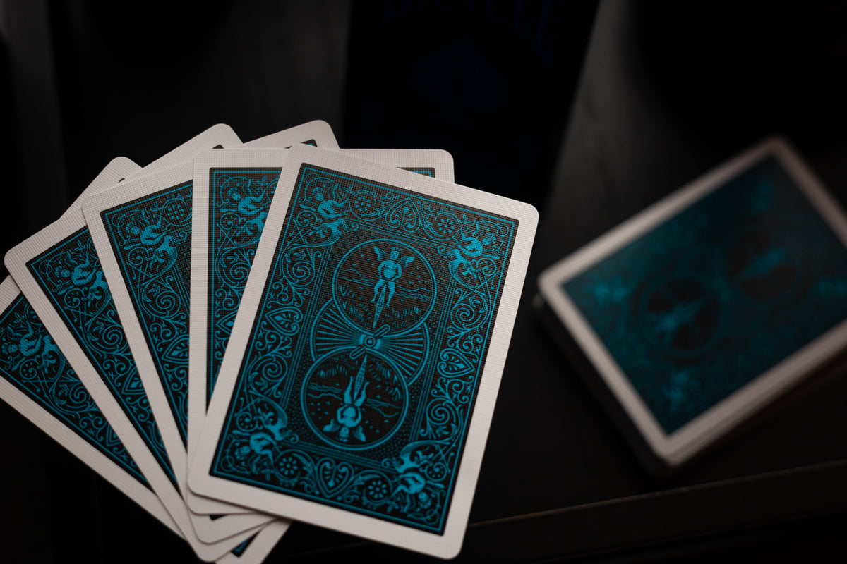 Bicycle Neon Cool-Blue blue Rider Back cards in a fan