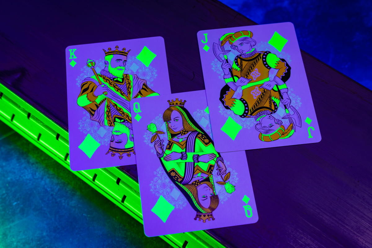 Bicycle Neon Green-Glo custom diamond court cards under UV blacklight