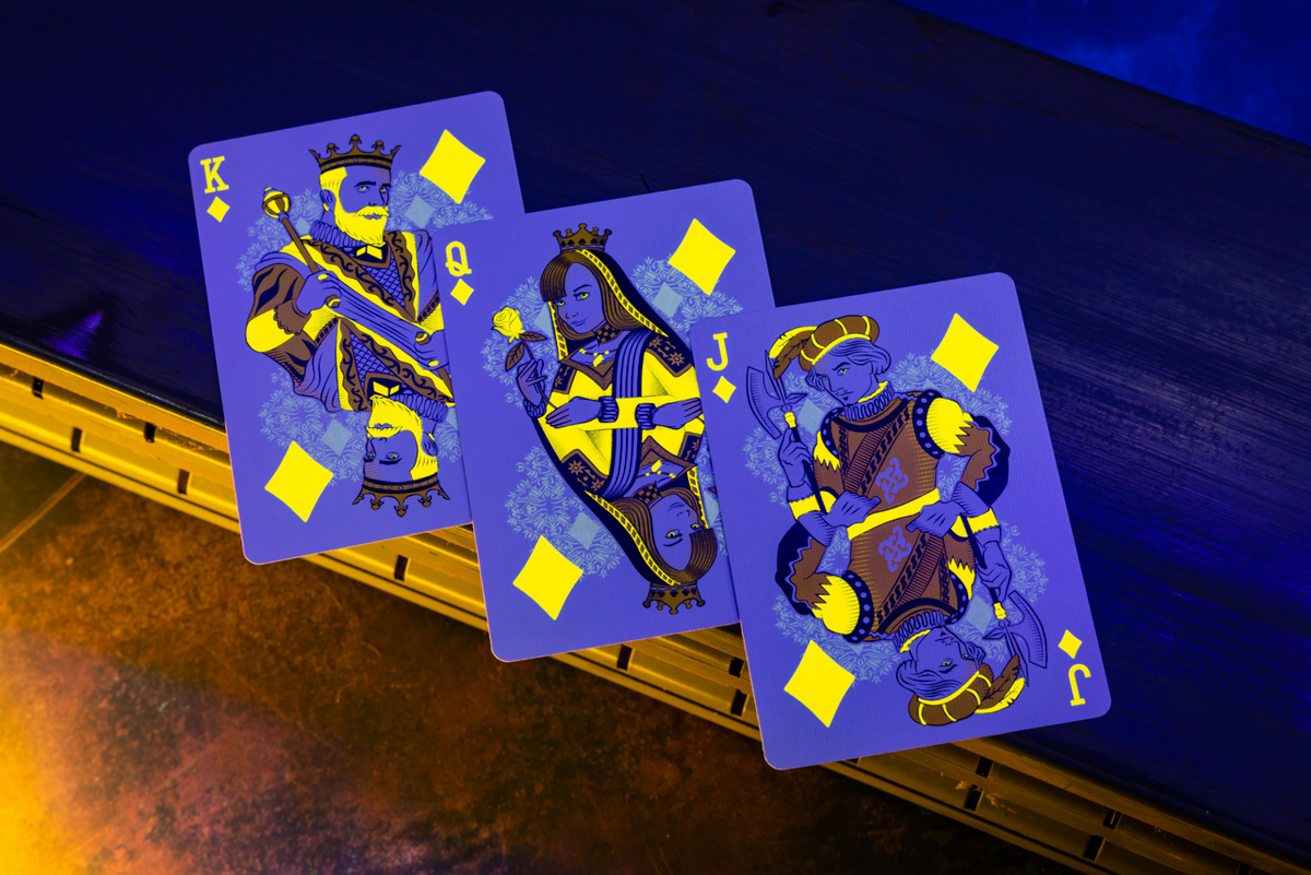 Bicycle Neon Yellow-Starburst custom diamond court cards under UV blacklight