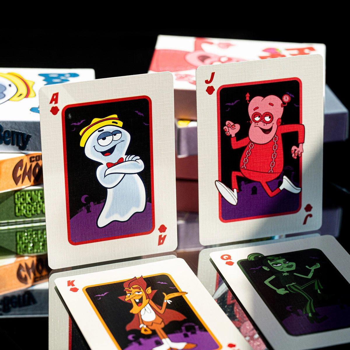 Boo Berry Ace displayed with Franken Berry, Count Chocula, and Carmella Creeper court cards.