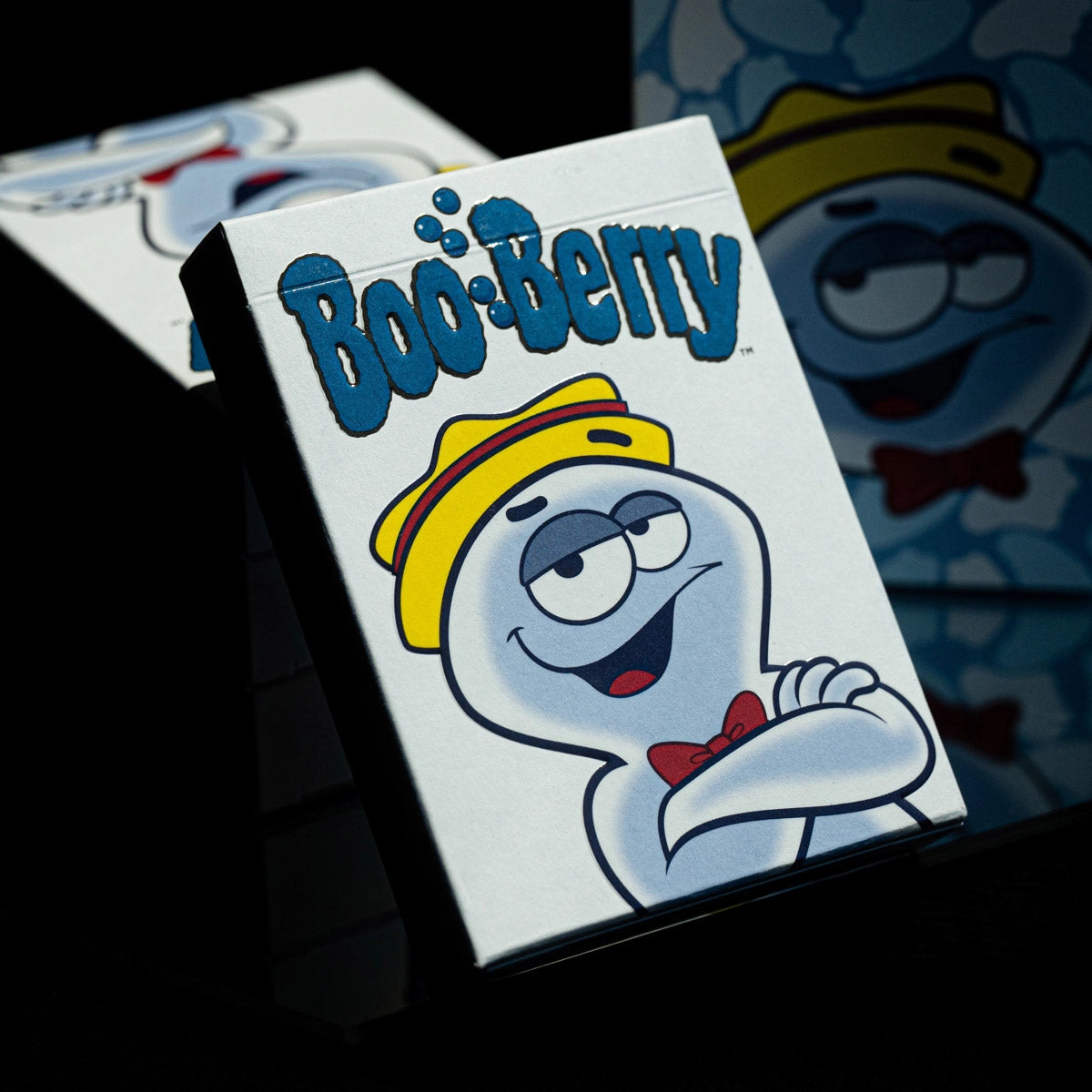 Angled view of the Boo Berry tuck-box front with additional boxes in the background.