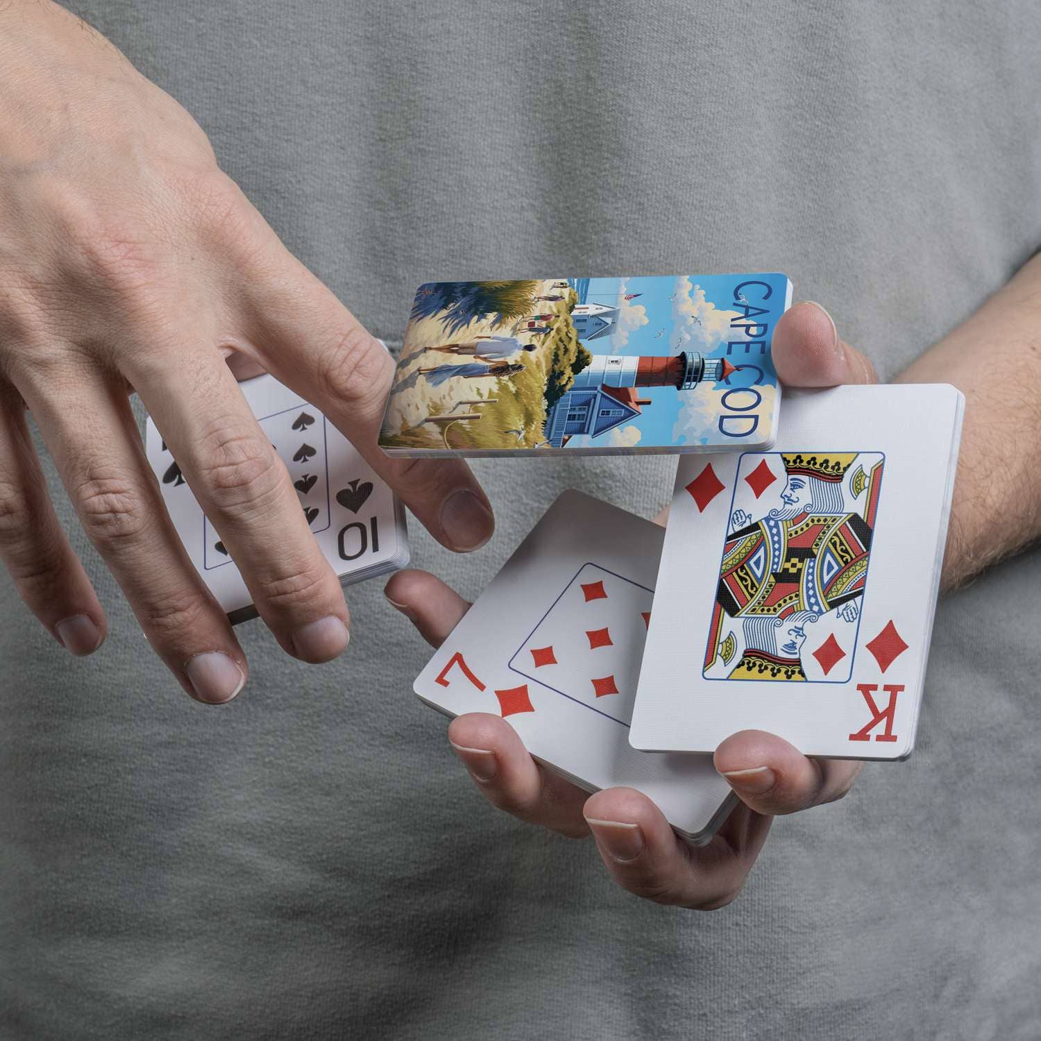Close-up of Boardwalk Cape Cod card back and traditional playing-card faces