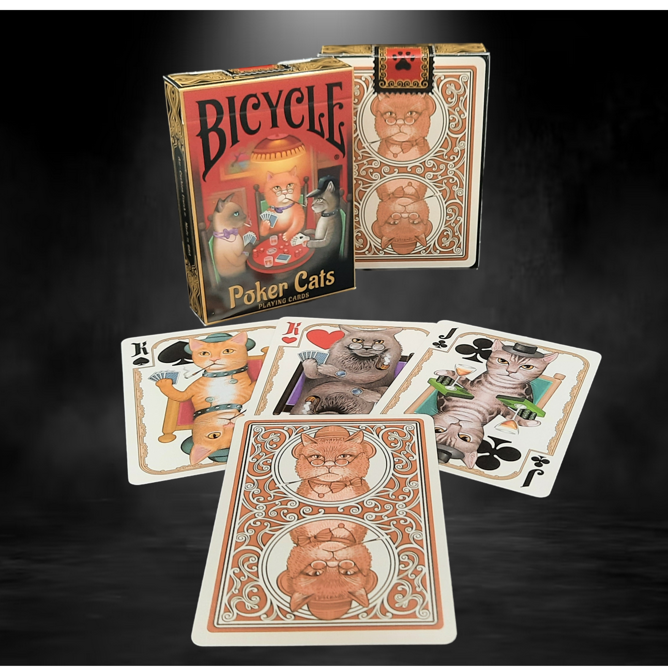 Bicycle Poker Cats playing cards with packaging on a dark background