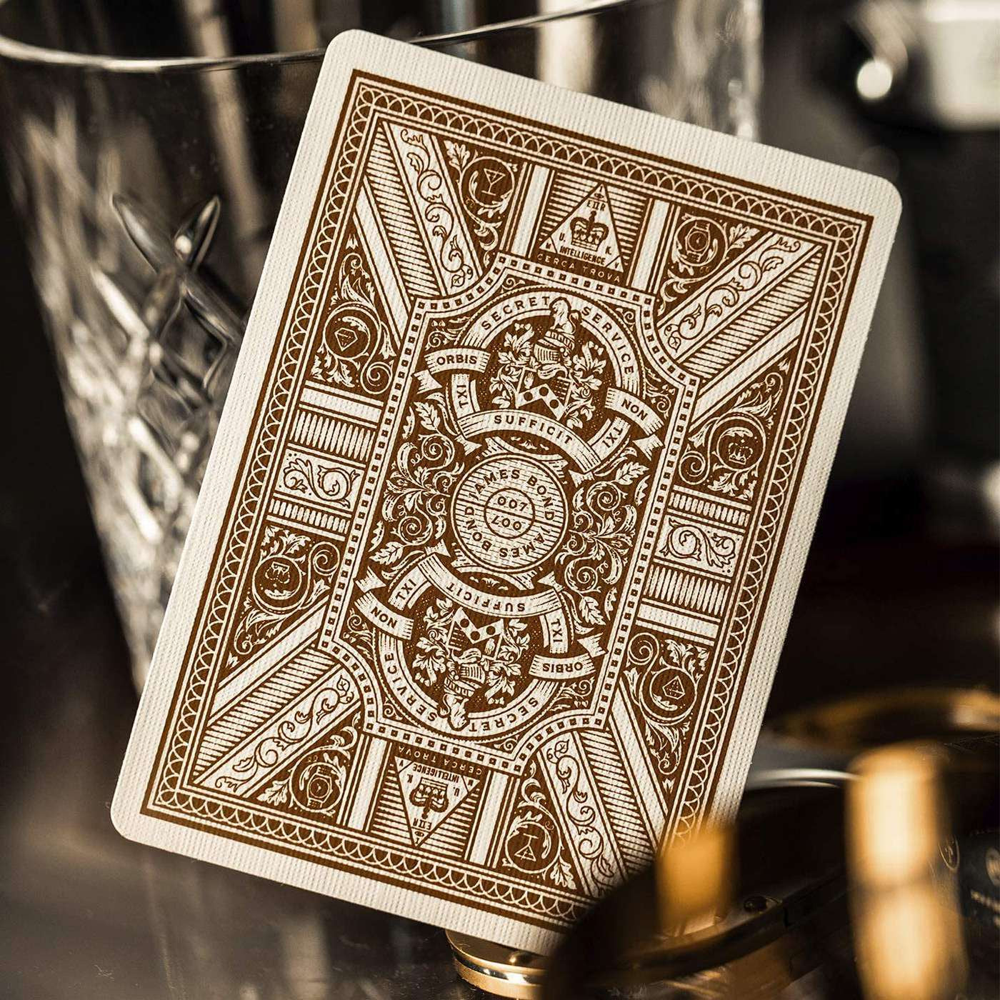 Decorative playing card with intricate design on a reflective surface