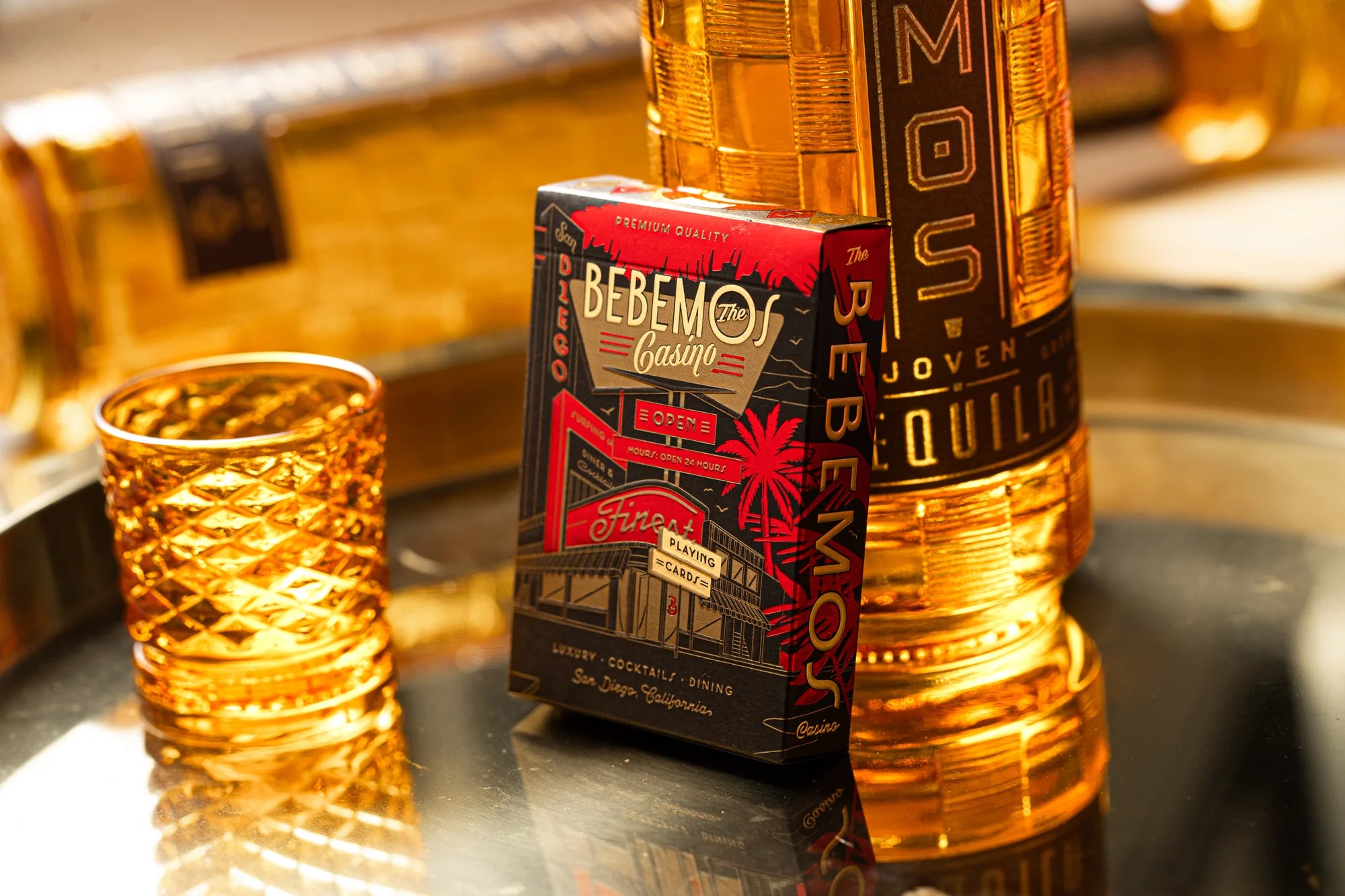 Bottle of Bebemo Quilo with packaging on a reflective surface