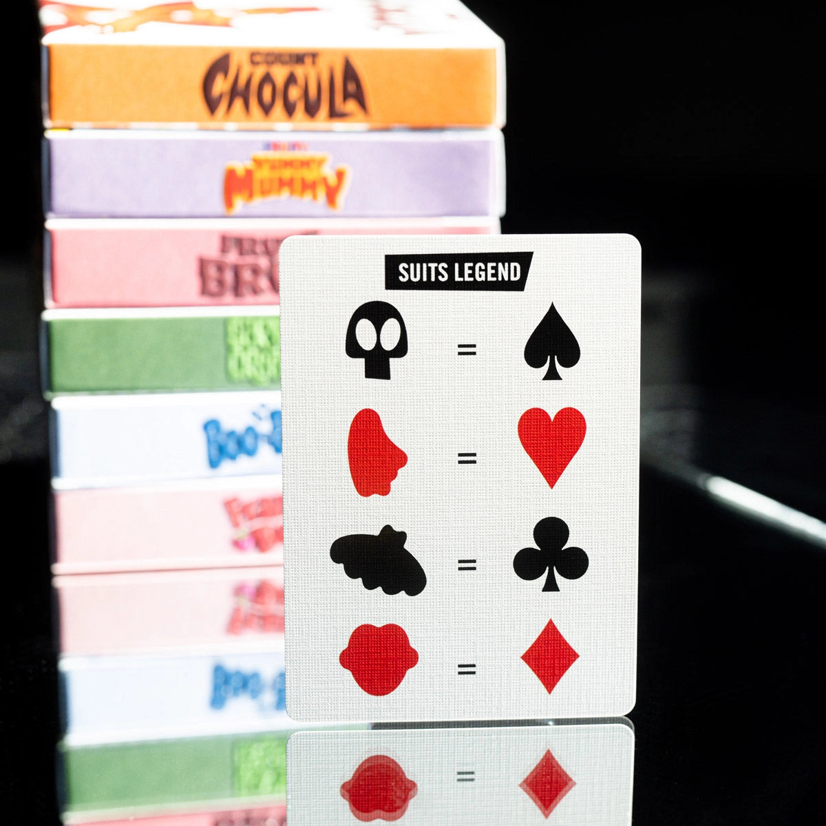 Monster Cereals suits-legend card showing the custom symbols beside their traditional suit equivalents.