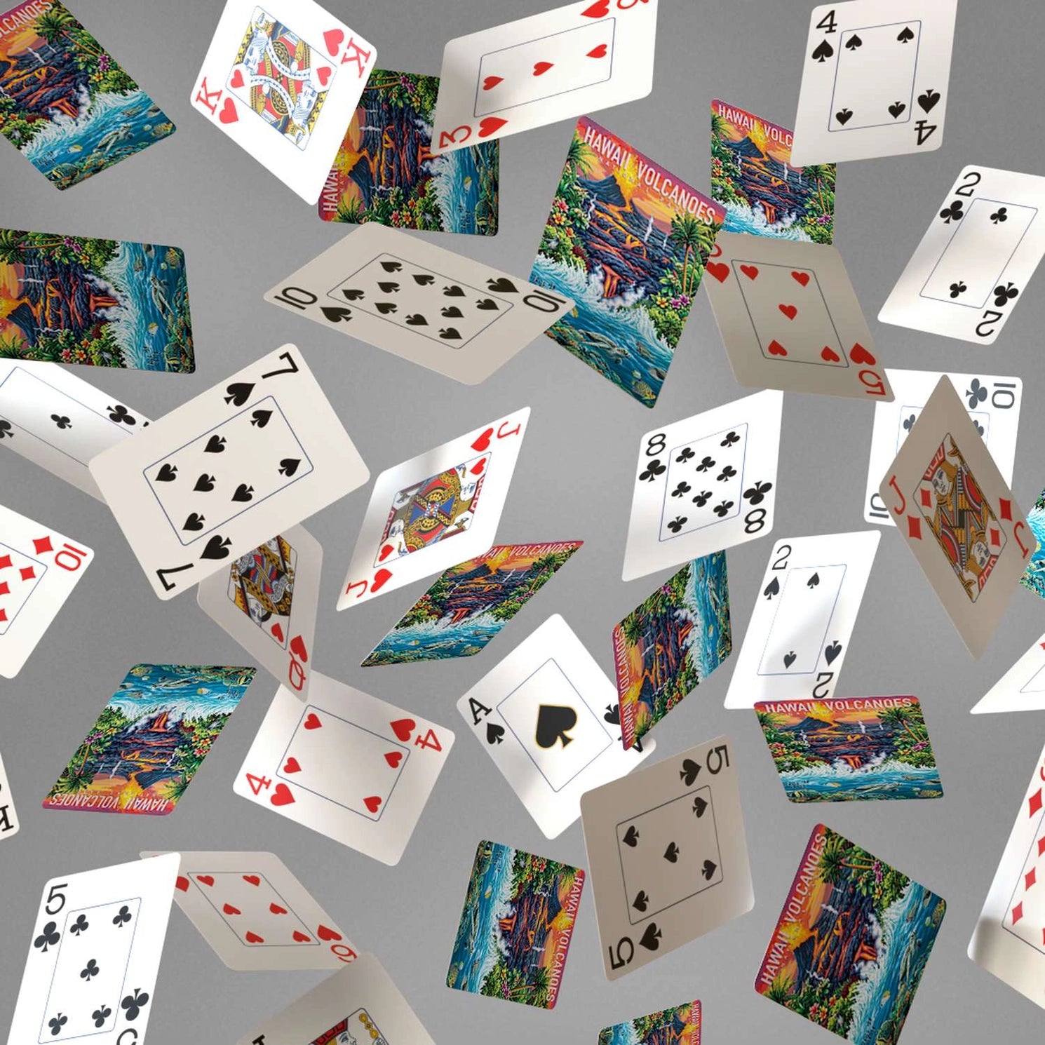 Hawai'i Volcanoes playing cards showing jumbo-index faces and colorful lava and ocean scenic card backs