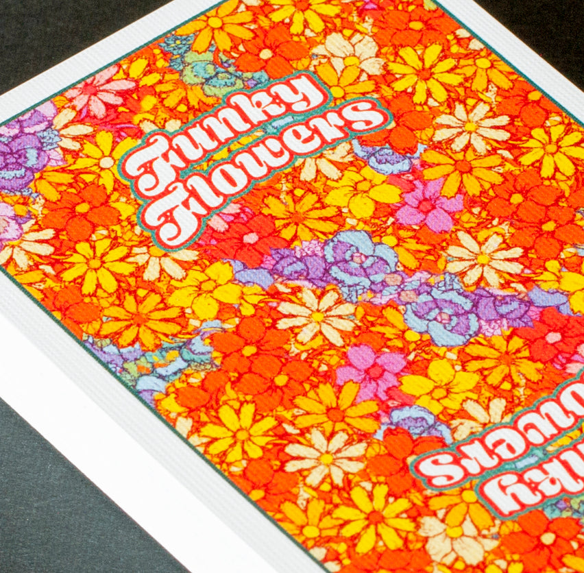Close-up of Bicycle Funky Flower Playing Cards back design with dense floral pattern and Funky Flowers text