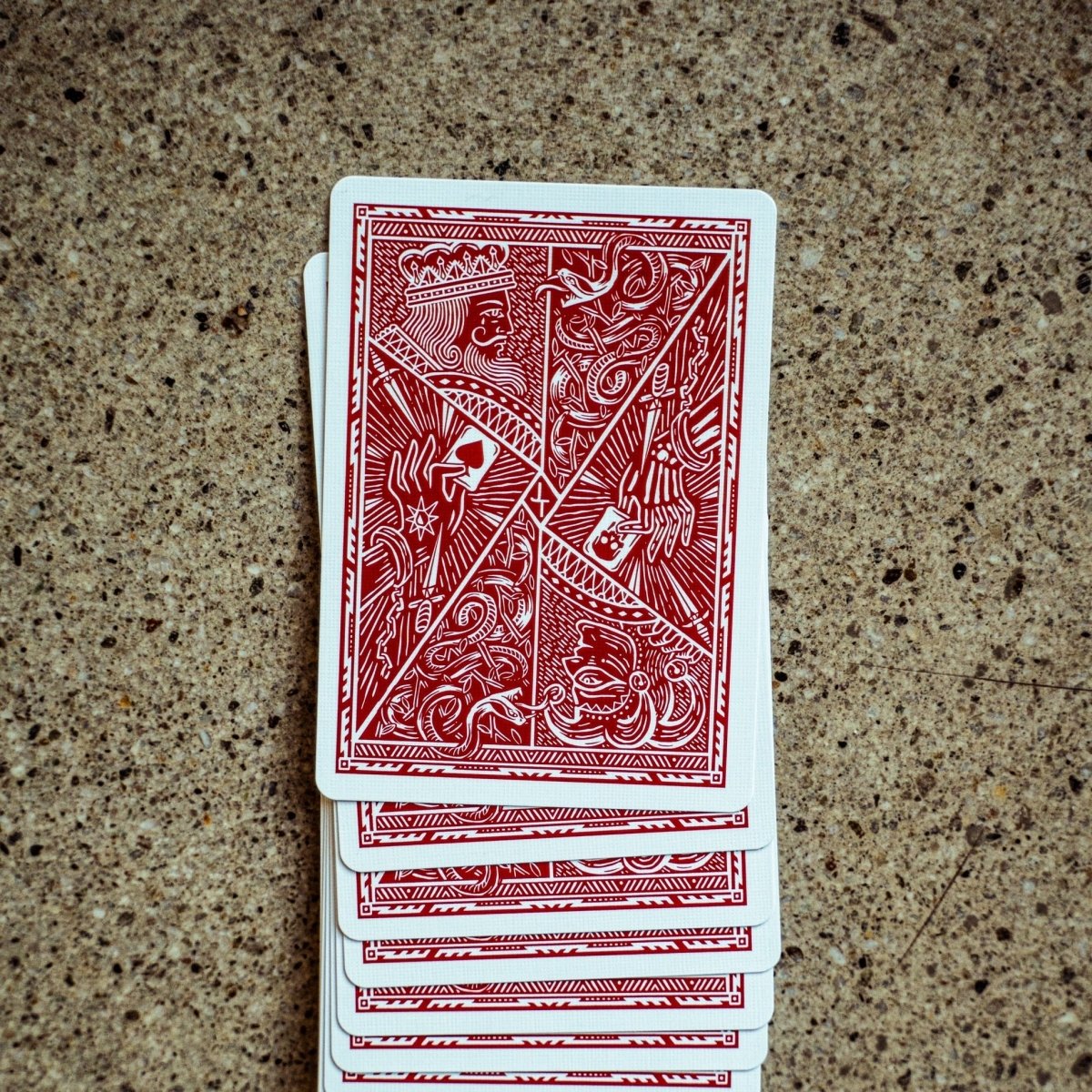 Joker and the Thief Blood Red card backs displayed in a spread