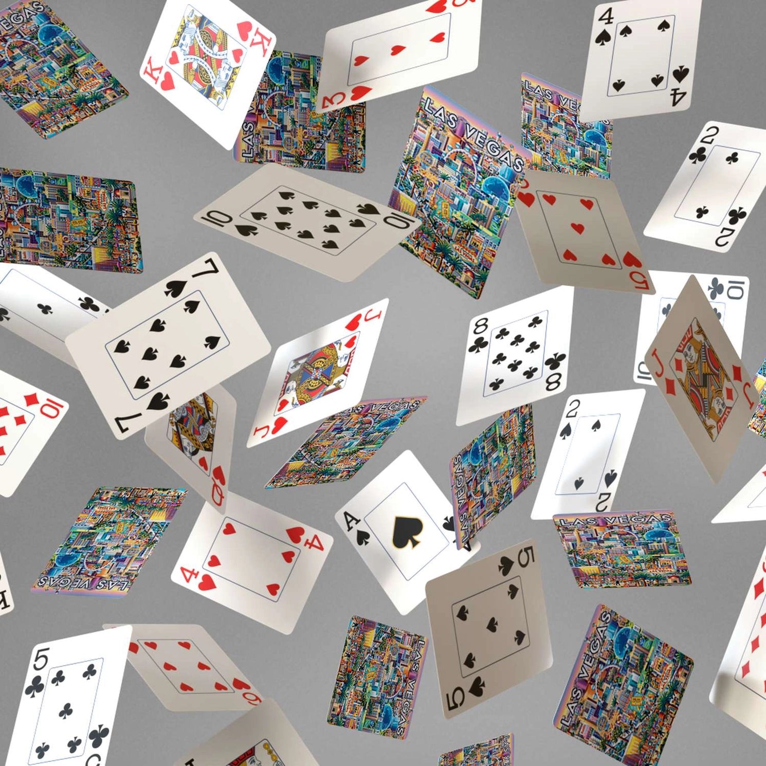 Las Vegas Strip playing cards showing jumbo-index faces and colorful illustrated Las Vegas card backs